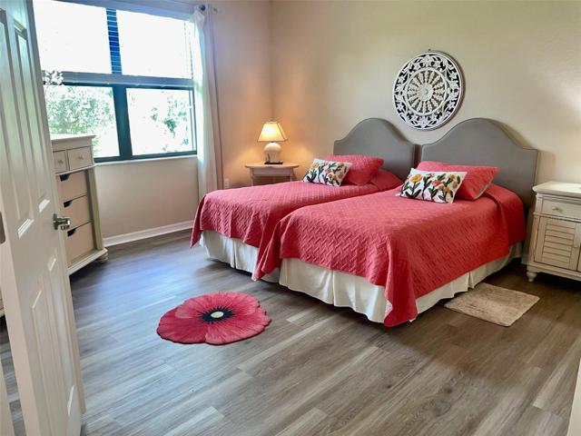 Master Bedroom with newly installed luxury vinyl plank flooring.