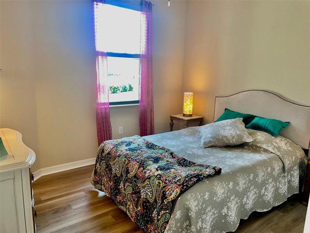Guest Room with newly installed luxury vinyl waterproof plank flooring.