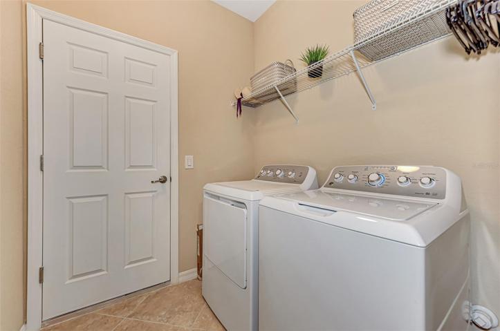 Laundry Room includes the washer and dryer. Door to garage on the left.