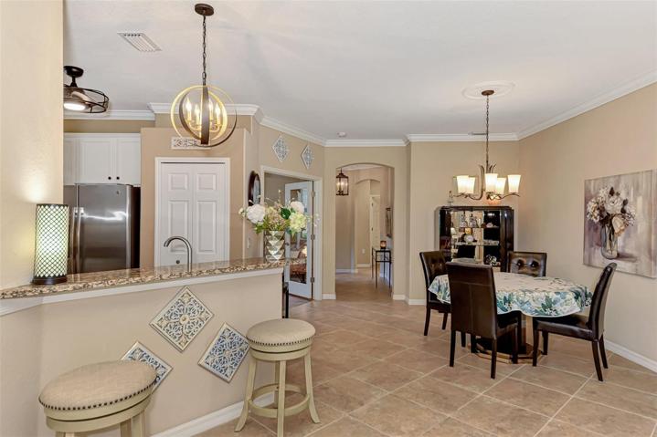 Breakfast Bar is also good for party h'ordeurves. Distinctive light fixtures.