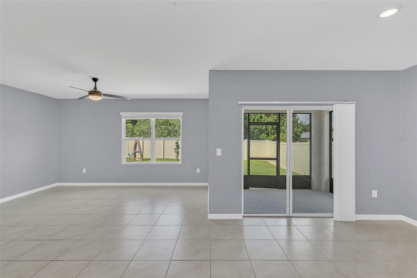 Dining room - sliders to the lanai - and family room combo