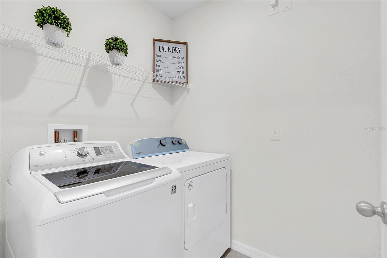 Laundry room - washer and dryer convey!
