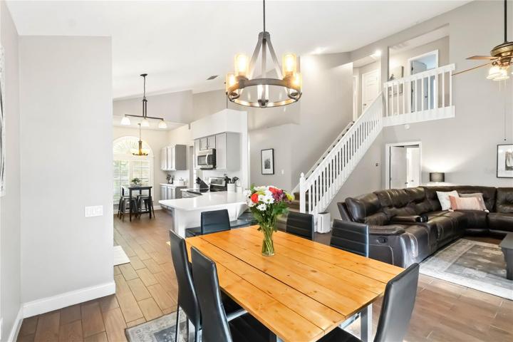 Dining area opens to kitchen and living area