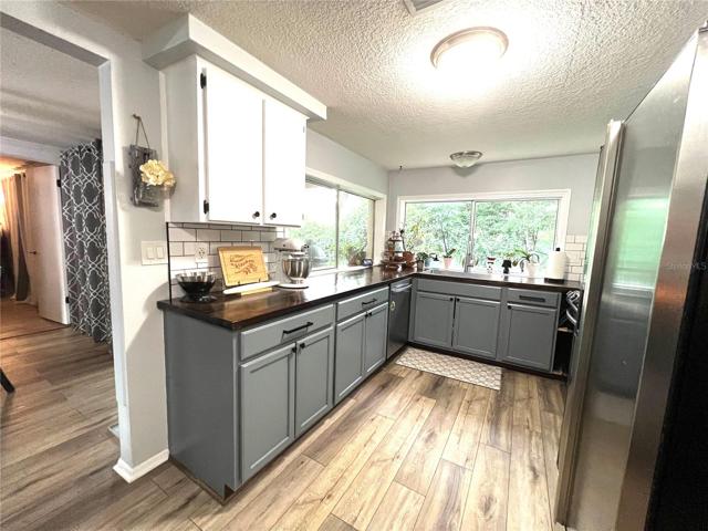 KITCHEN VIEW FROM FAMILY ROOM