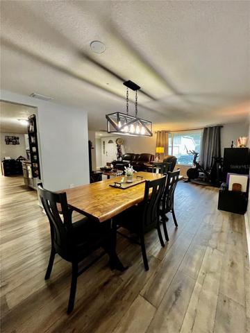 VIEW OF FORMAL DINING ROOM AND LIVING ROOM FROM MASTER BEDROOM