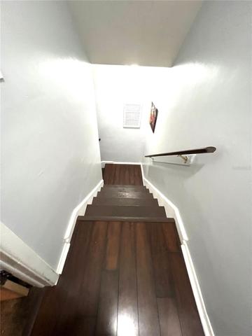 STAIRS TO BEDROOM AND BATH UPSTAIRS