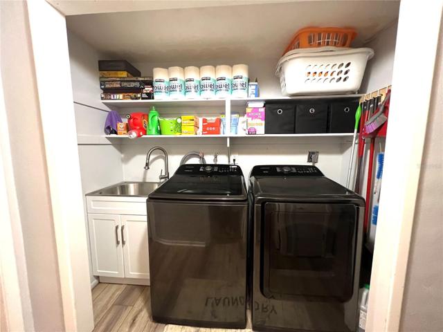 LAUNDRY CLOSET OFF OF FAMILY ROOM