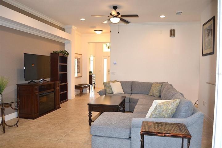 Accent ceiling and crown molding throughout adds a touch of elegance.