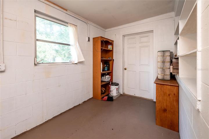 storage room 2 with door to side yard