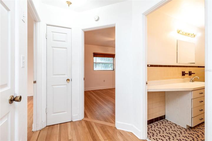 hallway with 2 cedar closets