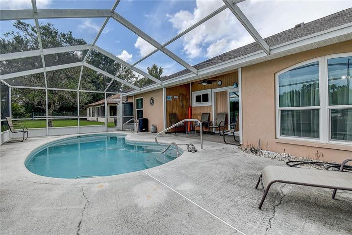 screened lanai in-ground pool