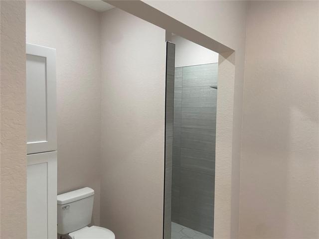 Walk-in Tiled Shower, Storage Cabinet