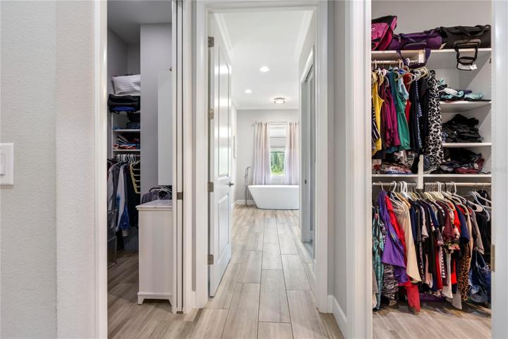 master hallway with 2 walk-in closets