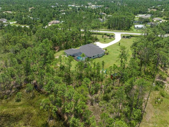 3 acres with trees make this home very private