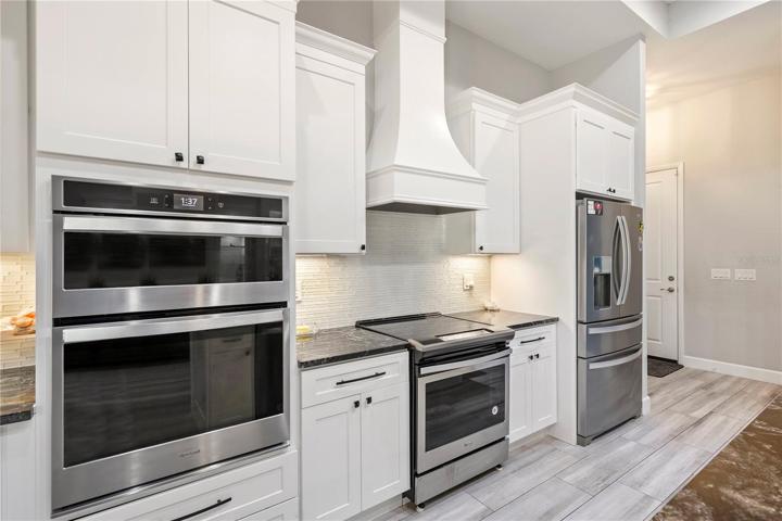 kitchen with built in ovens