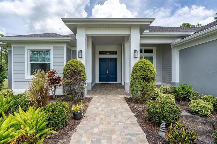 Front of home with elegant entry