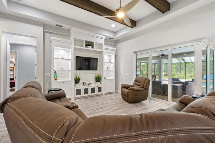 living room with built-in entertainment center