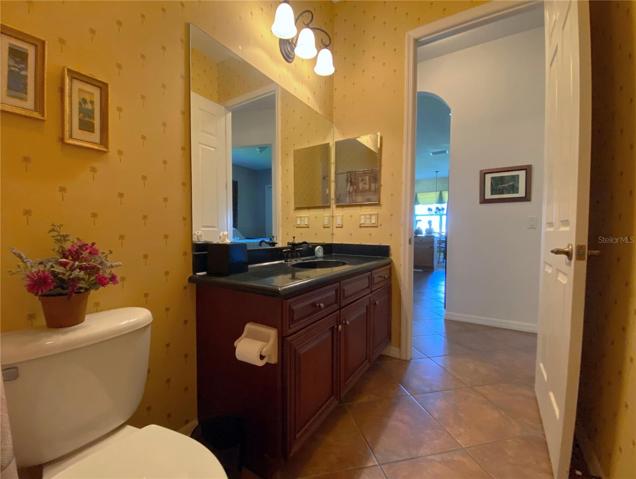 Guest Bathroom with Granite Countertop on Vanity