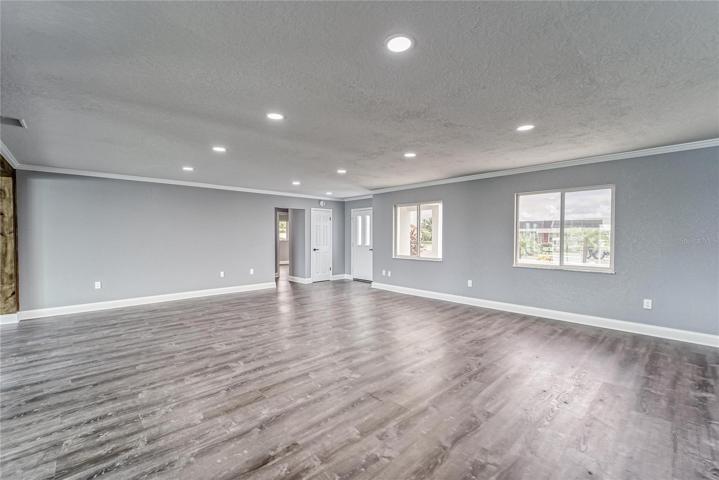 Living room flows into Kitchen and Dining room