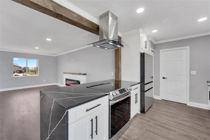 Kitchen with waterfall countertops
