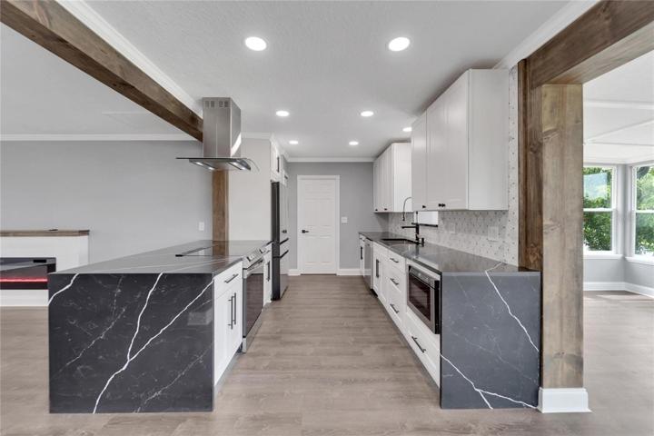 Kitchen with waterfall countertops