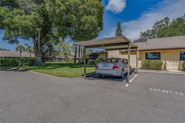 COVERED PARKING RIGHT OUT YOUR FRONT DOOR