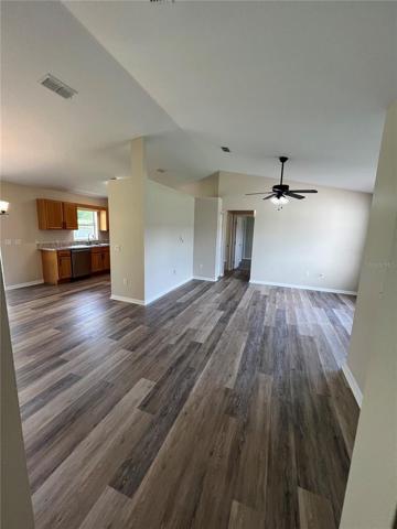 View from the garage entry of the Living room and kitchen