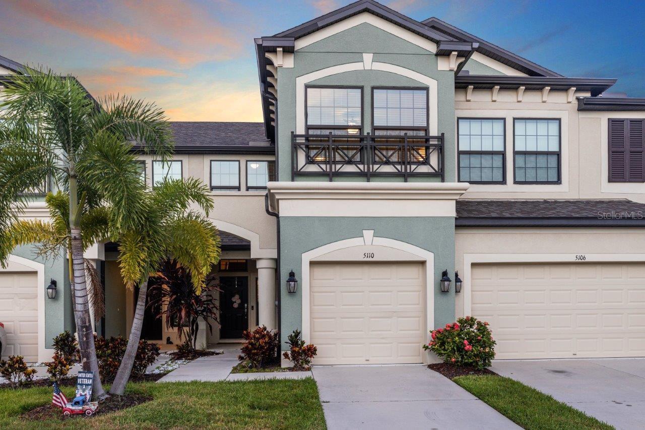Front Elevation featuring the one car garage and tandem parking.