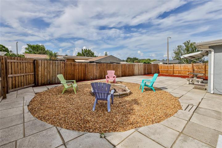 BEAUTIFUL LOW MAINTENANCE LANDSCAPING/FIRE PIT.
