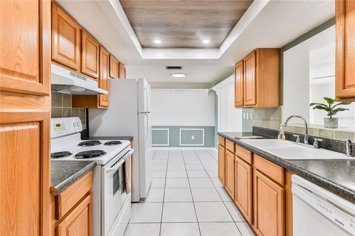KITCHEN, VIEW OF DINING AREA