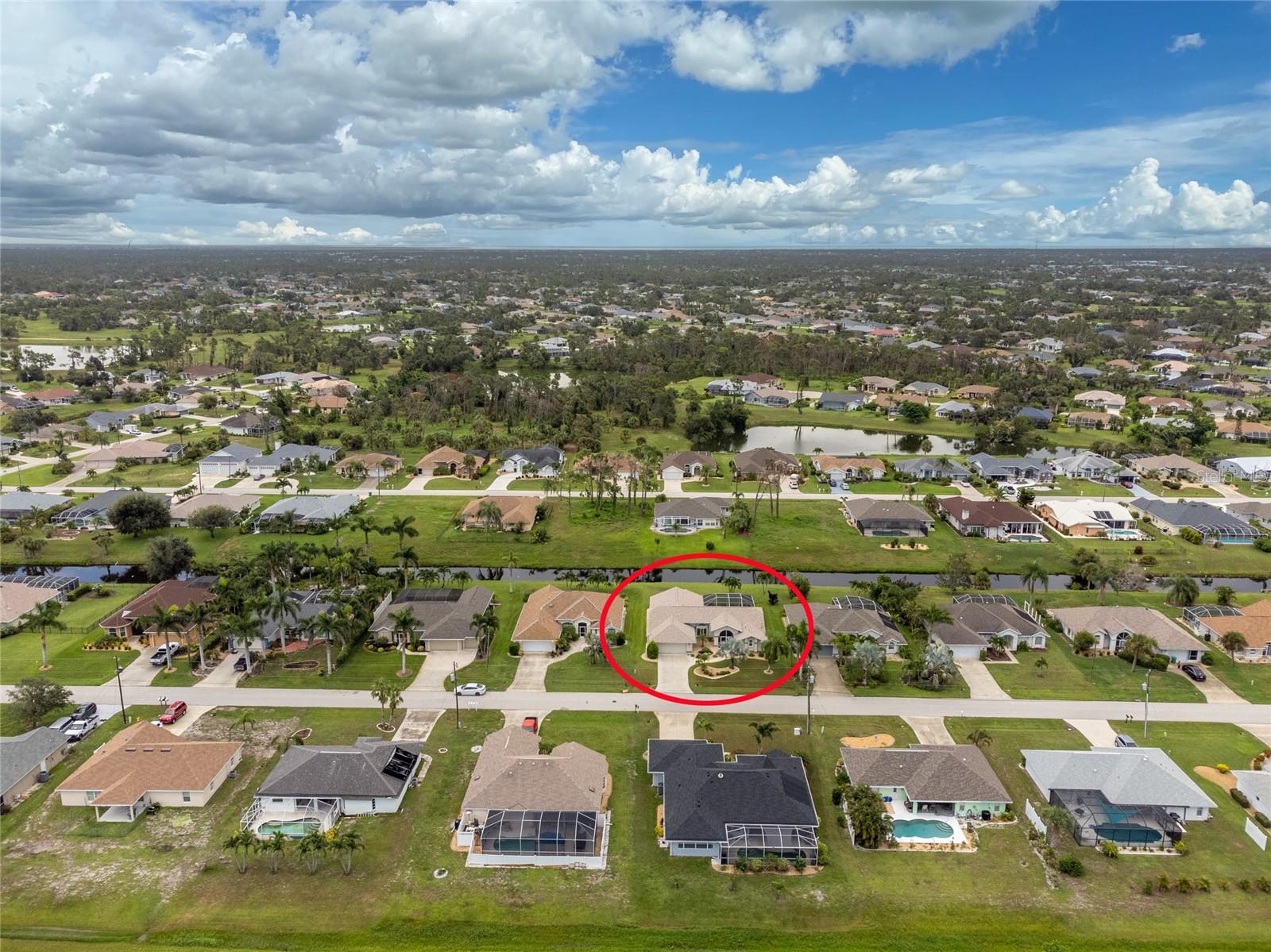 Aerial view of the front of this waterfront home.