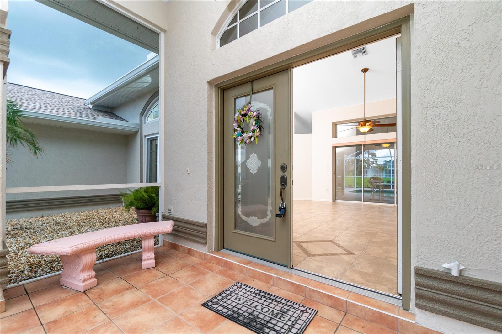 Elegant double doors welcome you to this beautiful home.