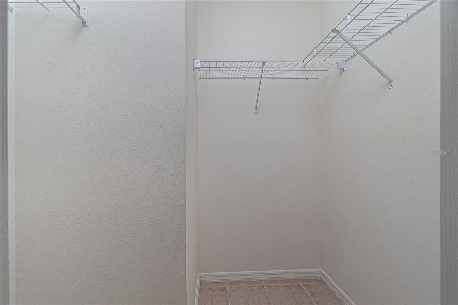 This is the second walk-in closet in the master bedroom.