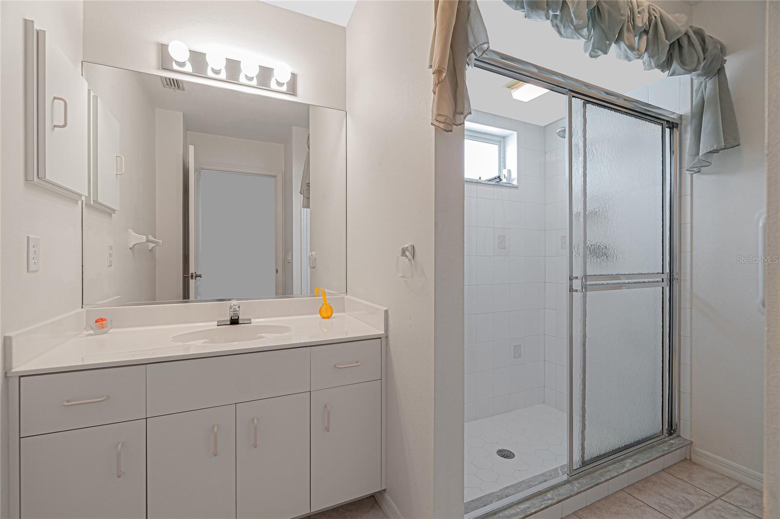 Bathroom #2 has tiled flooring.