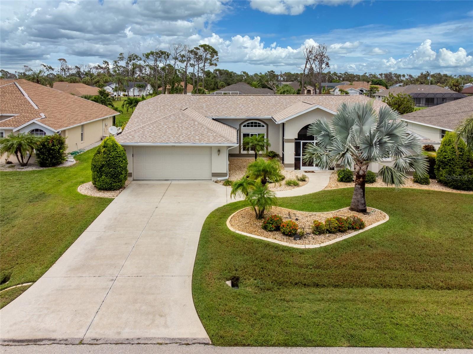 Two car garage and screened front entry to this beautiful home.