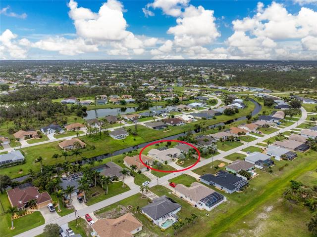 This aerial view shows 110 Broadmoor Ln and the surrounding neighborhood.