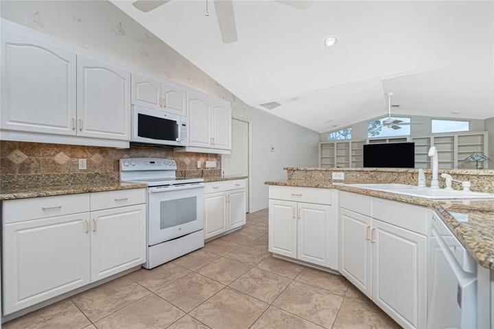 The kitchen appliances include a Samsung French door refrigerator (2018), GE microwave (2020), smooth top range and LG dishwasher (2019).
