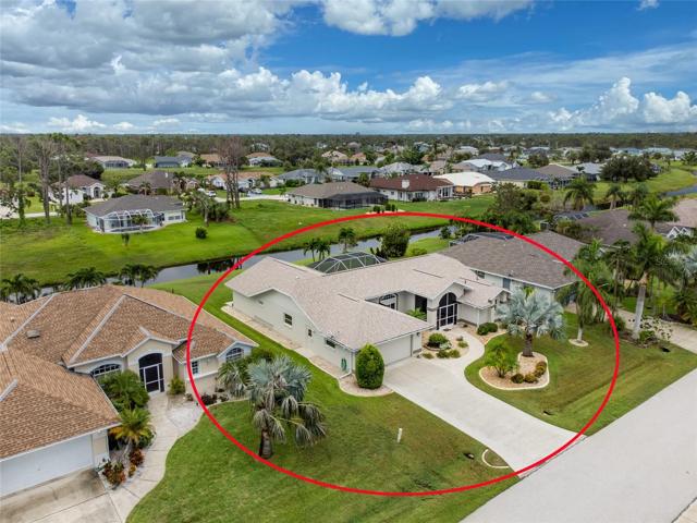 Backing up to a freshwater canal, this home has an irrigation system that utilized the canal water.
