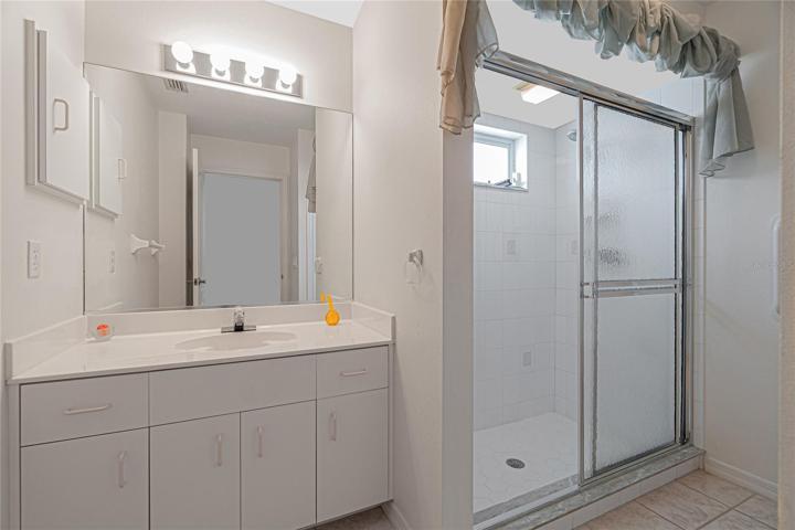 Bathroom #2 has tiled flooring.