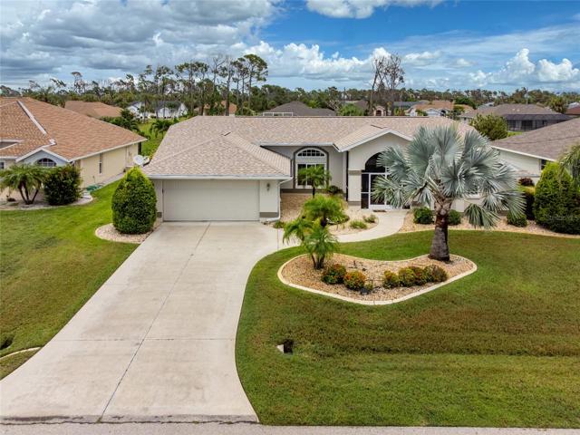 Two car garage and screened front entry to this beautiful home.