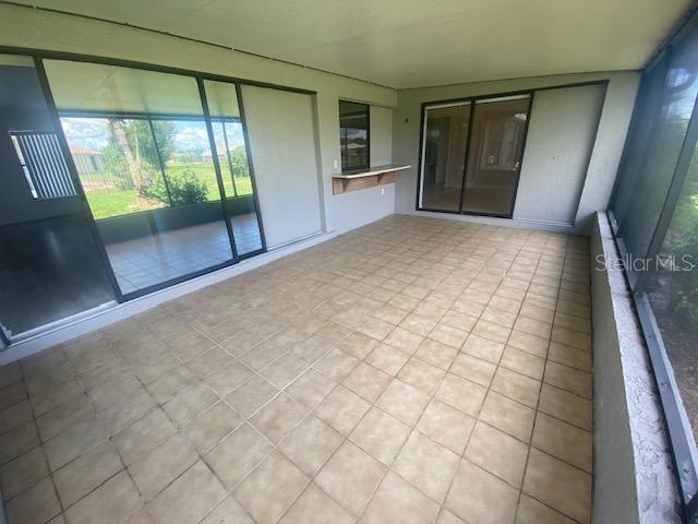 LARGE TILED SCREENED LANAI