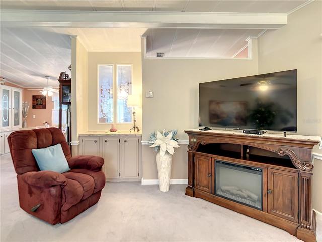 Beautiful glass feature in the wall between living room and kitchen