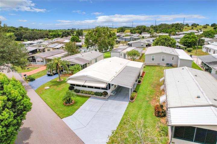 Aerial of the home and neigbors