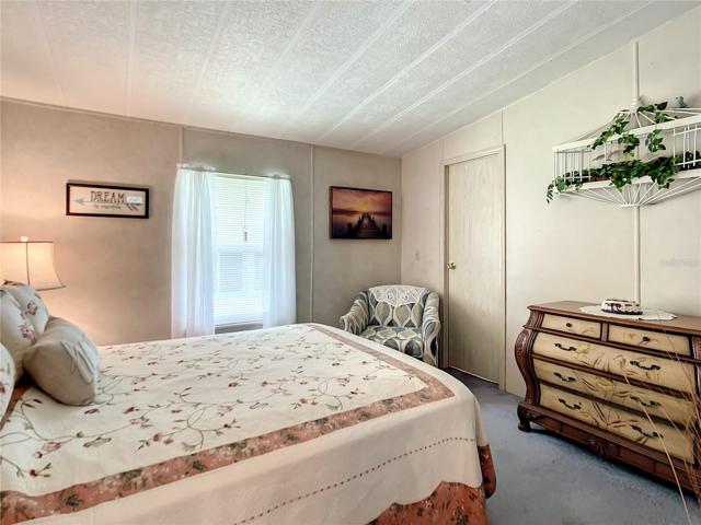 Guest bedroom with walk in closet
