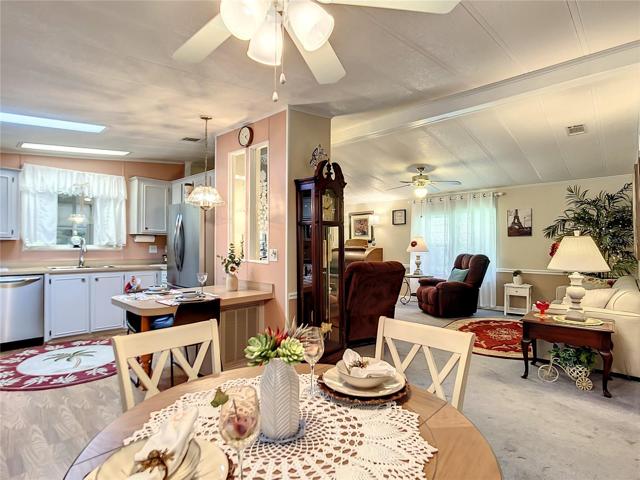 Dining room with view into the kitchen and living room