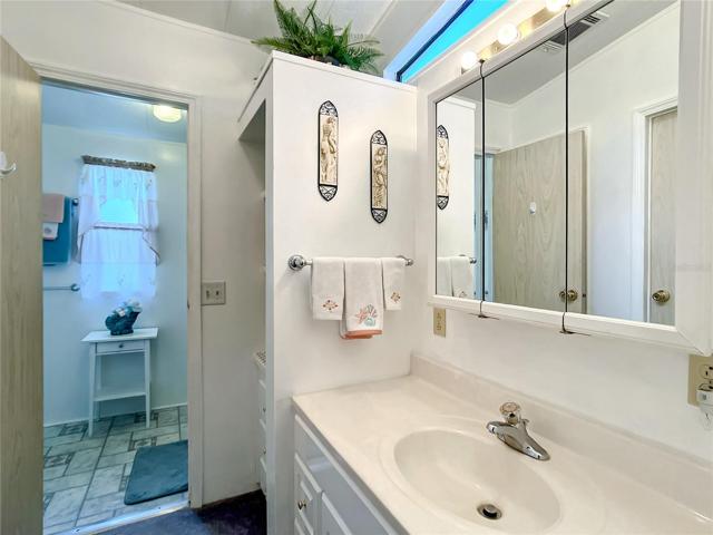The bathroom has lots of natural daylight