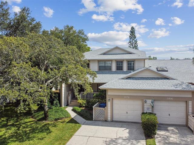 two story end unit with one car garage