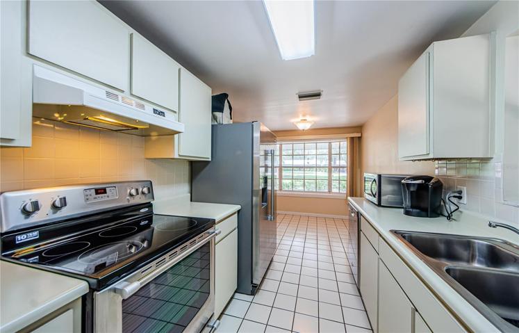 Kitchen with eat in space by bay window
