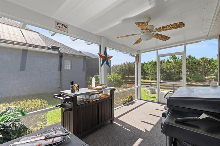 OFF OF THE FLORIDA ROOM IS GREAT OUTDOOR COOKING AREA... PERFECT FOR GRILLING