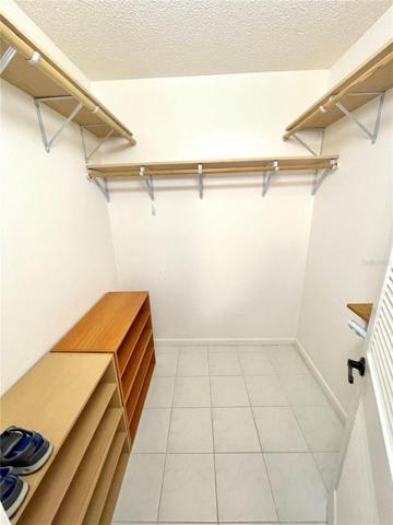 Large walk-in closet in the bedroom